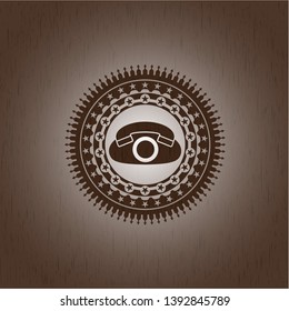 phone icon inside realistic wood emblem