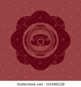 phone icon inside red emblem