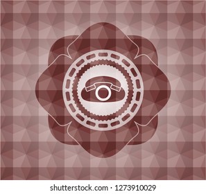 phone icon inside red seamless geometric emblem.