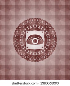 phone icon inside red seamless badge with geometric pattern.