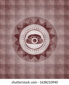 phone icon inside red seamless badge with geometric pattern background.
