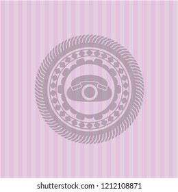 phone icon inside retro style pink emblem
