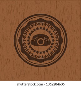 phone icon inside retro style wood emblem