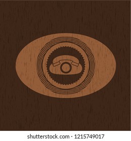 phone icon inside retro wood emblem