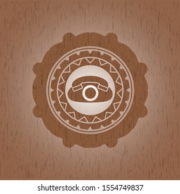 phone icon inside retro wood emblem