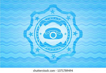 phone icon inside water representation badge.