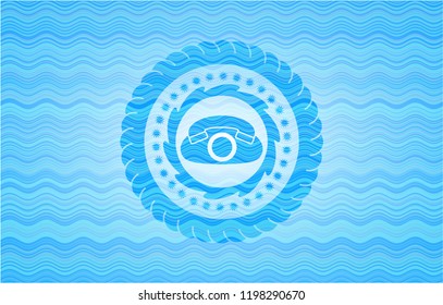 phone icon inside water wave representation emblem.