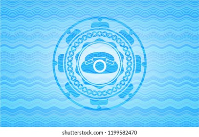 phone icon inside water wave representation emblem.
