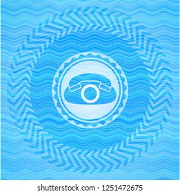 phone icon inside water wave concept style emblem.