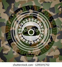 phone icon on camouflaged texture