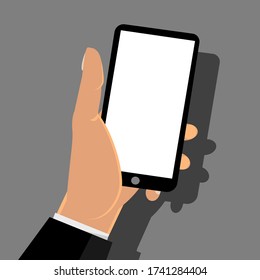 Phone on hand flat design on grey background.