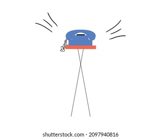 El teléfono está sobre la mesa. El teléfono fijo está sonando