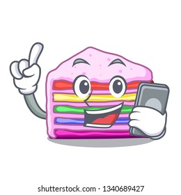 With phone rainbow cake on plastic cartoon plate