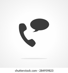 Phone receiver as "contact us" icon. Telephone handset with talk bubble