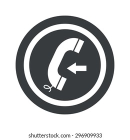 Phone receiver and left arrow in circle, on black circle, isolated on white
