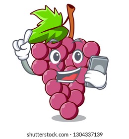 With phone red grapes fruit in cartoon shape