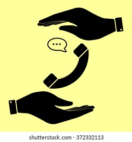 Phone with speech bubble sign. Save or protect symbol by hands.