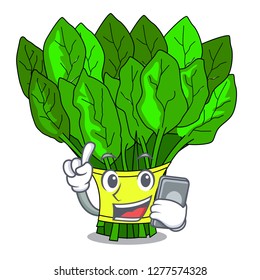 With phone spinach in a the cartoon basket