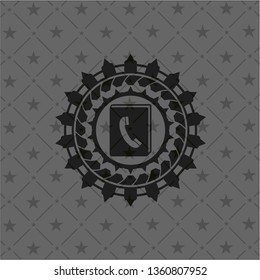 phonebook icon inside black emblem
