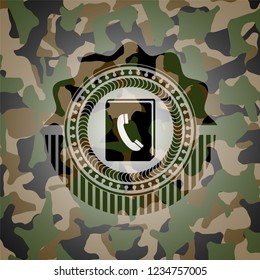 phonebook icon inside camouflage emblem