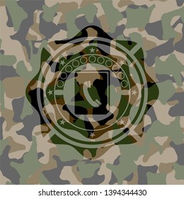 phonebook icon inside camouflaged emblem