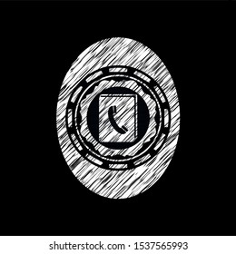 phonebook icon inside chalkboard emblem written on a blackboard