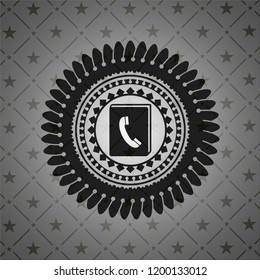 phonebook icon inside dark emblem