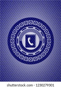 phonebook icon inside denim background