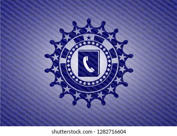 phonebook icon inside denim background