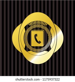 phonebook icon inside gold emblem or badge
