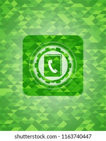phonebook icon inside green emblem with mosaic background