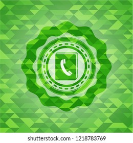 phonebook icon inside green emblem with triangle mosaic background