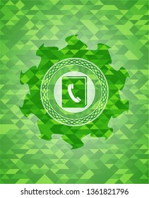 phonebook icon inside green emblem with mosaic ecological style background