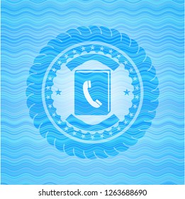 phonebook icon inside light blue water style emblem.