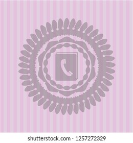 phonebook icon inside pink emblem. Vintage.