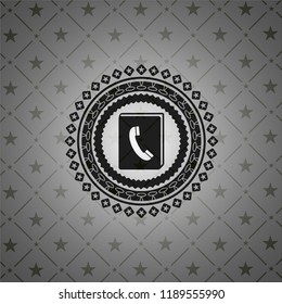 phonebook icon inside realistic dark emblem