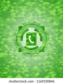 phonebook icon inside realistic green emblem. Mosaic background