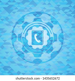 phonebook icon inside realistic sky blue emblem. Mosaic background
