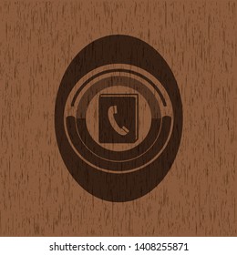 phonebook icon inside realistic wood emblem