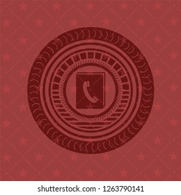 phonebook icon inside red icon or emblem