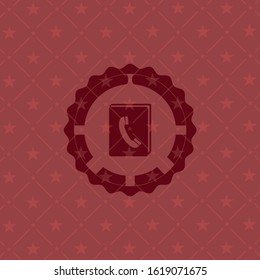 phonebook icon inside red emblem. Vintage.