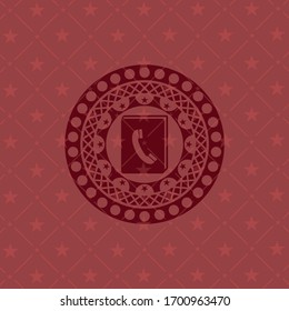 phonebook icon inside retro red emblem
