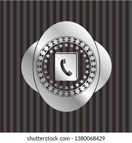phonebook icon inside silver badge or emblem