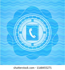 phonebook icon inside sky blue water style emblem.