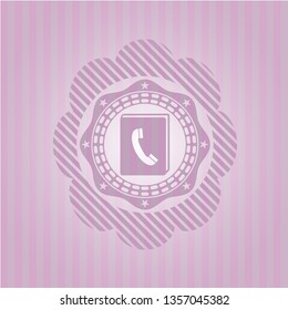 phonebook icon inside vintage pink emblem