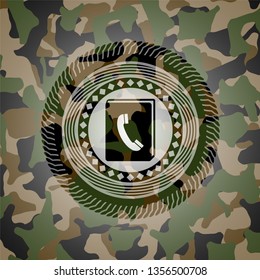 phonebook icon on camouflaged texture