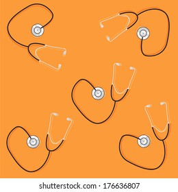 phonendoscopes on orange background