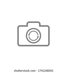 Photo camera with arrows icon