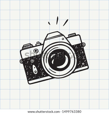 Photo camera doodle icon. Hand drawn sketch in vector 商業照片 © 