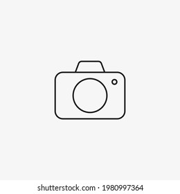 Photo camera flat of black color. Line Vector photography icon on white background
